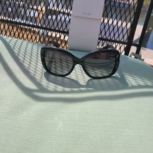 Prada polarized sun glasses